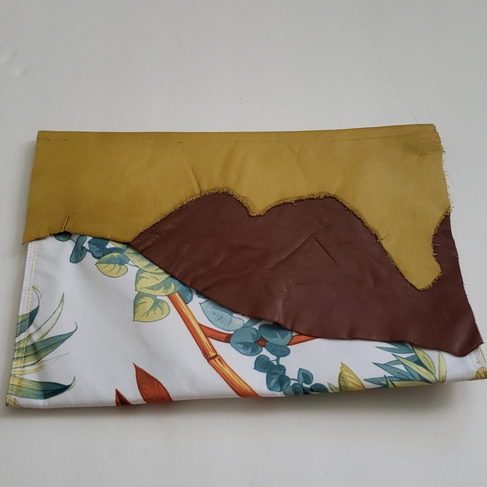 Stitch Niche Leather Clutch